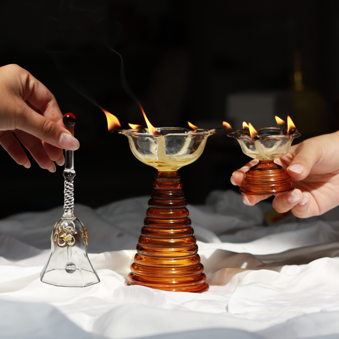 Combination of Glass Diya and Orange Glass Bell